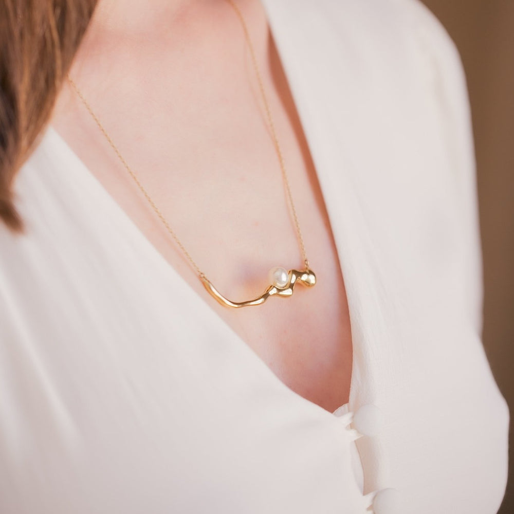 
                  
                    FLOW Pearl Pendant Gold Necklace
                  
                