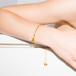 
                  
                    DROP Gold Beads & Pearl Bracelet
                  
                