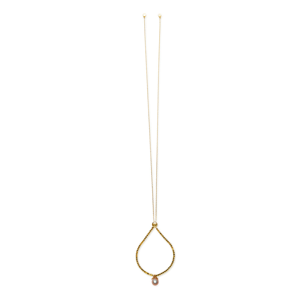 
                  
                    DROP Gold Necklace With Purple Pearl
                  
                