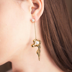 
                  
                    FLOW Asymmetric Gold Long Earrings
                  
                