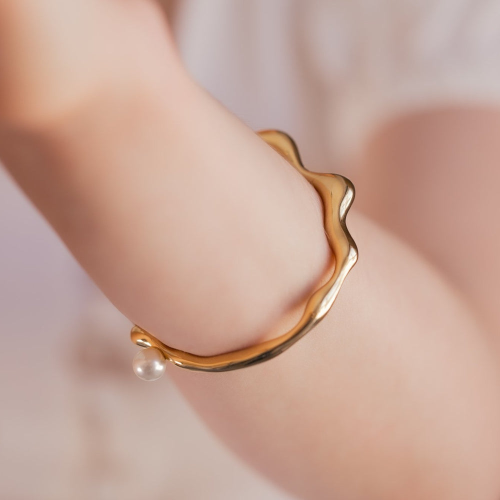 
                  
                    FLOW Gold Bangle With Pearl
                  
                