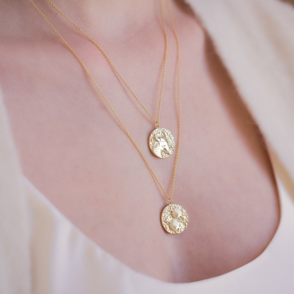 
                  
                    Taurus Zodiac Double Sided Coin Pendant Gold and Crystal Necklace
                  
                