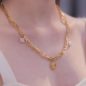 
                  
                    Starlight Gold Necklace with Pearl and Coin
                  
                