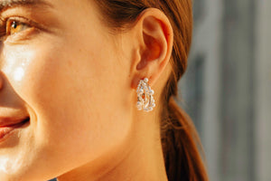 
                  
                    Bubbling White Gold Small Hoop Earrings
                  
                