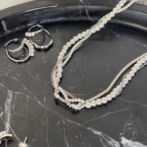 
                  
                    Bubbling White Gold Necklace with Mini Pearls
                  
                