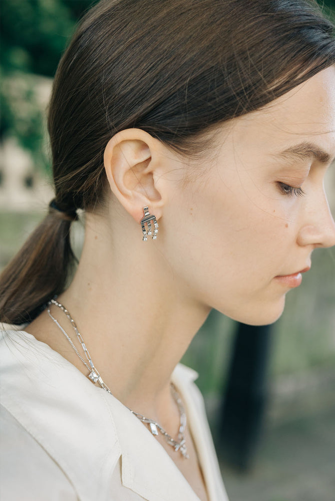 
                  
                    White Gold-plated Forks Earrings with Crystals
                  
                