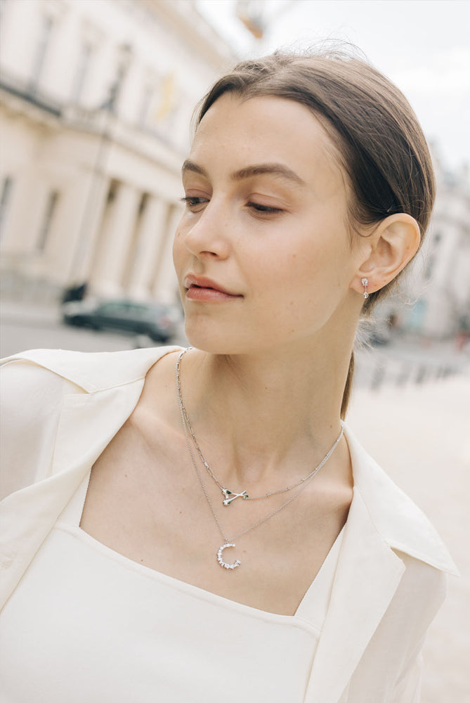 
                  
                    White Gold-plated Spoons Earrings with Pear Crystals
                  
                