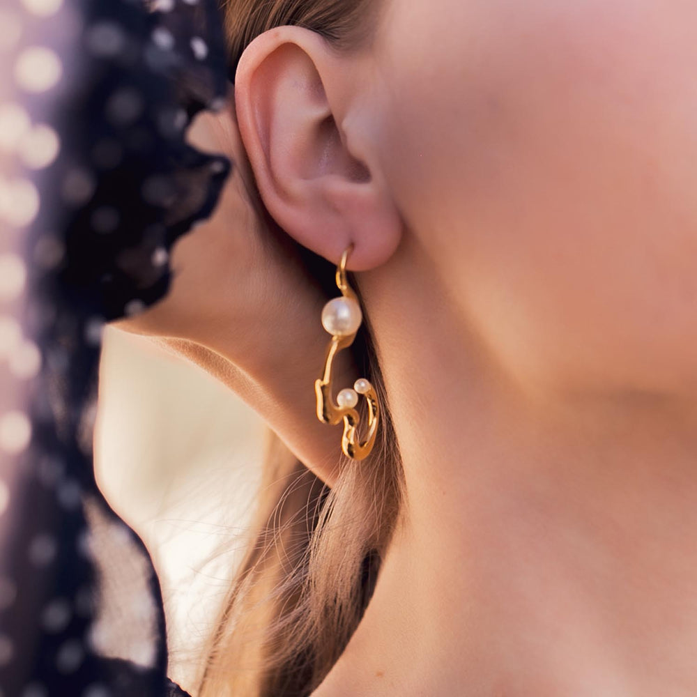 
                  
                    FLOW Gold Art Earrings With Pearls
                  
                