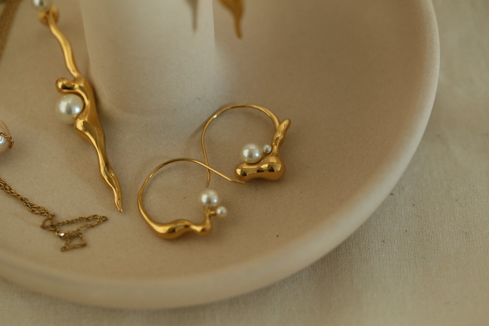 
                  
                    FLOW Asymmetric Gold Long Earrings
                  
                