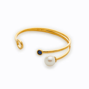 
                  
                    SS Pearl Bangle with Green Stone
                  
                